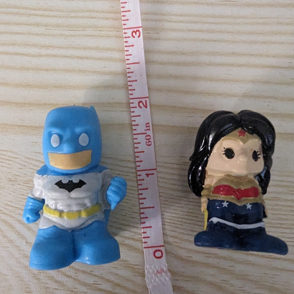 Blue and Red Superhero Figures